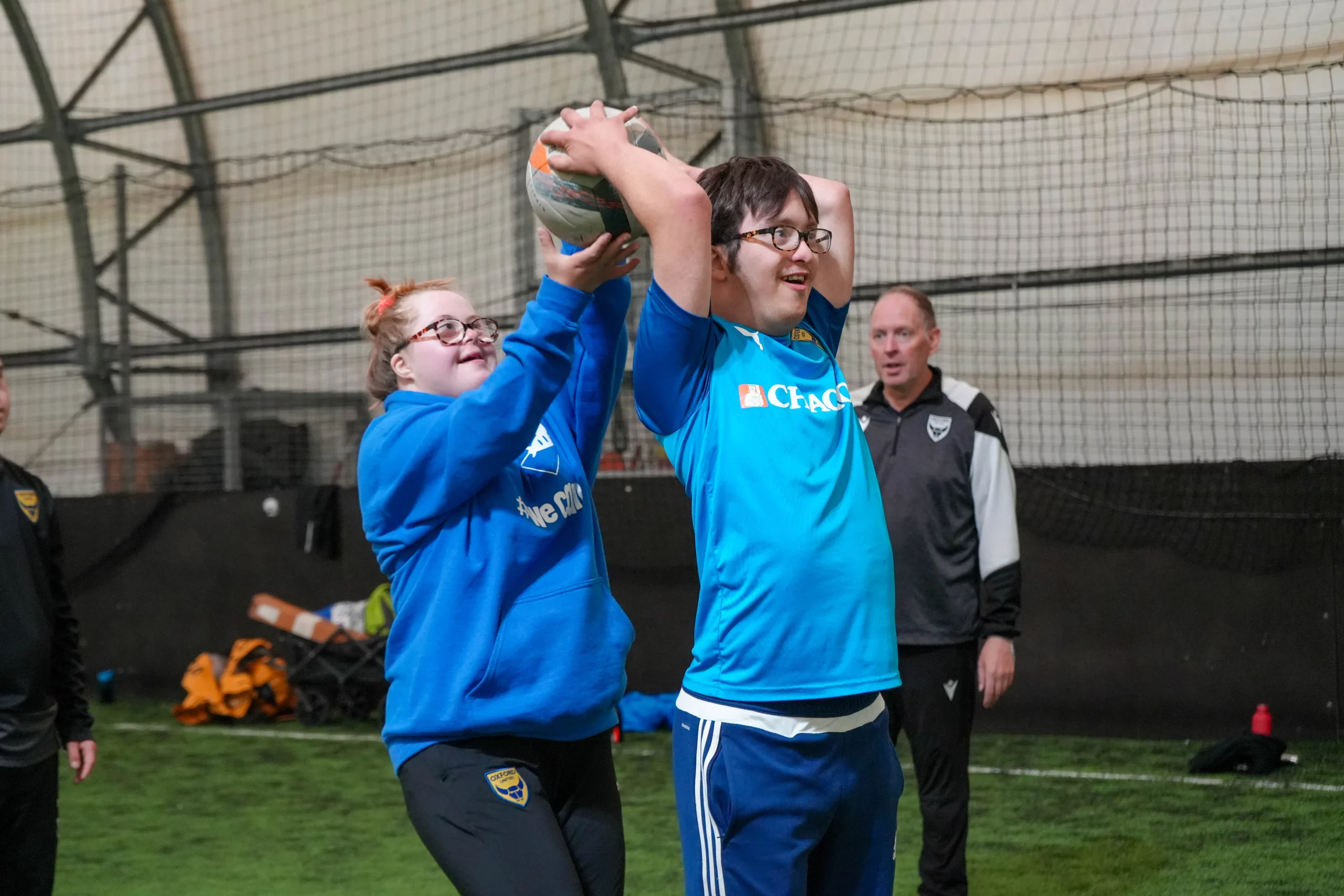Players of the Oxford United Tri-Stars team take part in a training drill.