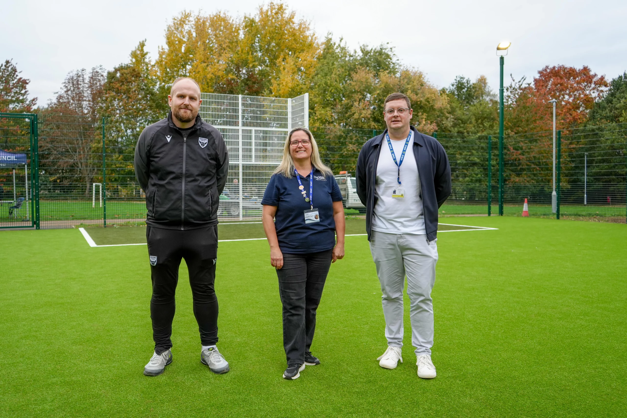 Mark Thomas, Lorraine Squire and Matt Everett at the new 3G pitch in Banbury.